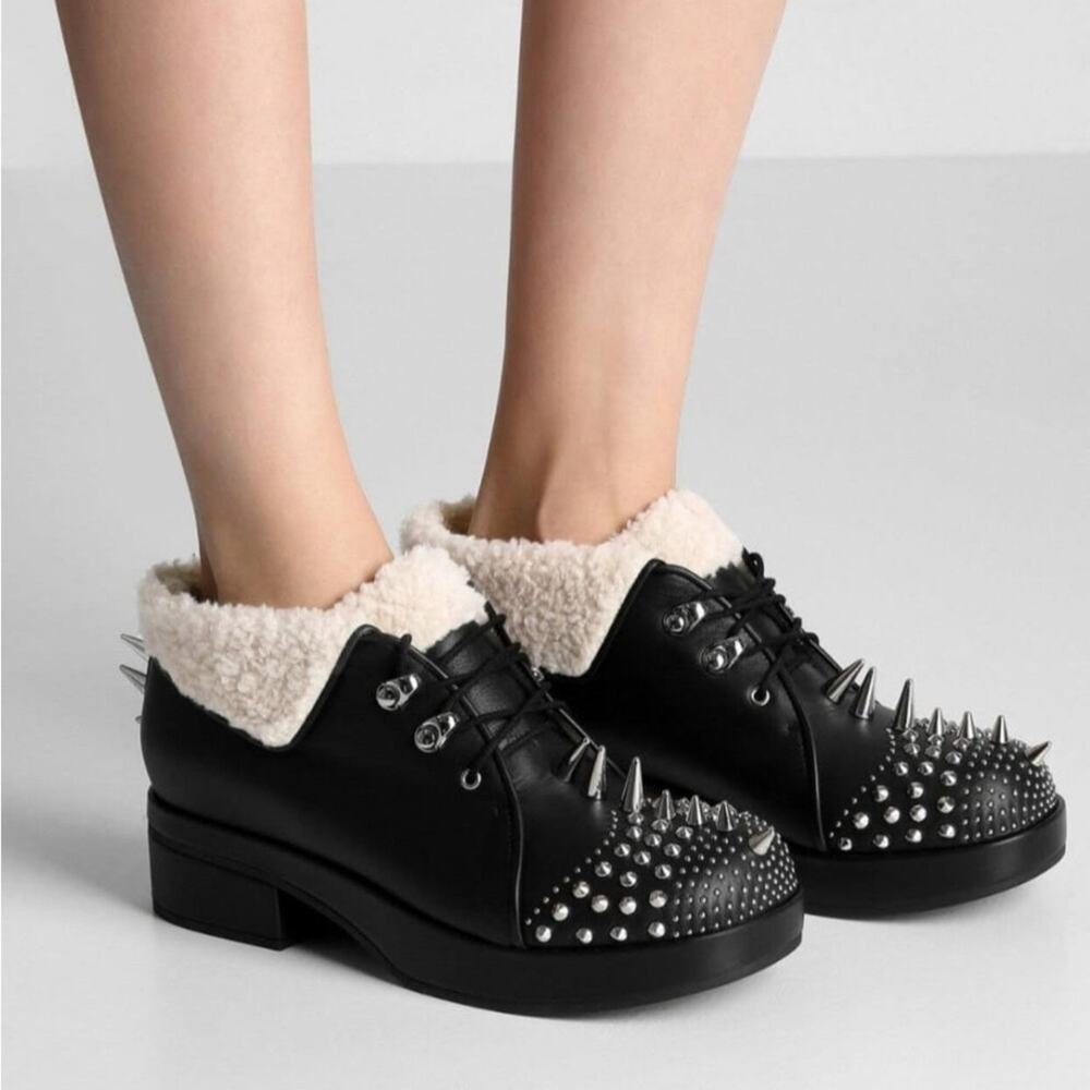 Gucci Women's Spiked Leather
Sherpa Platform Booties